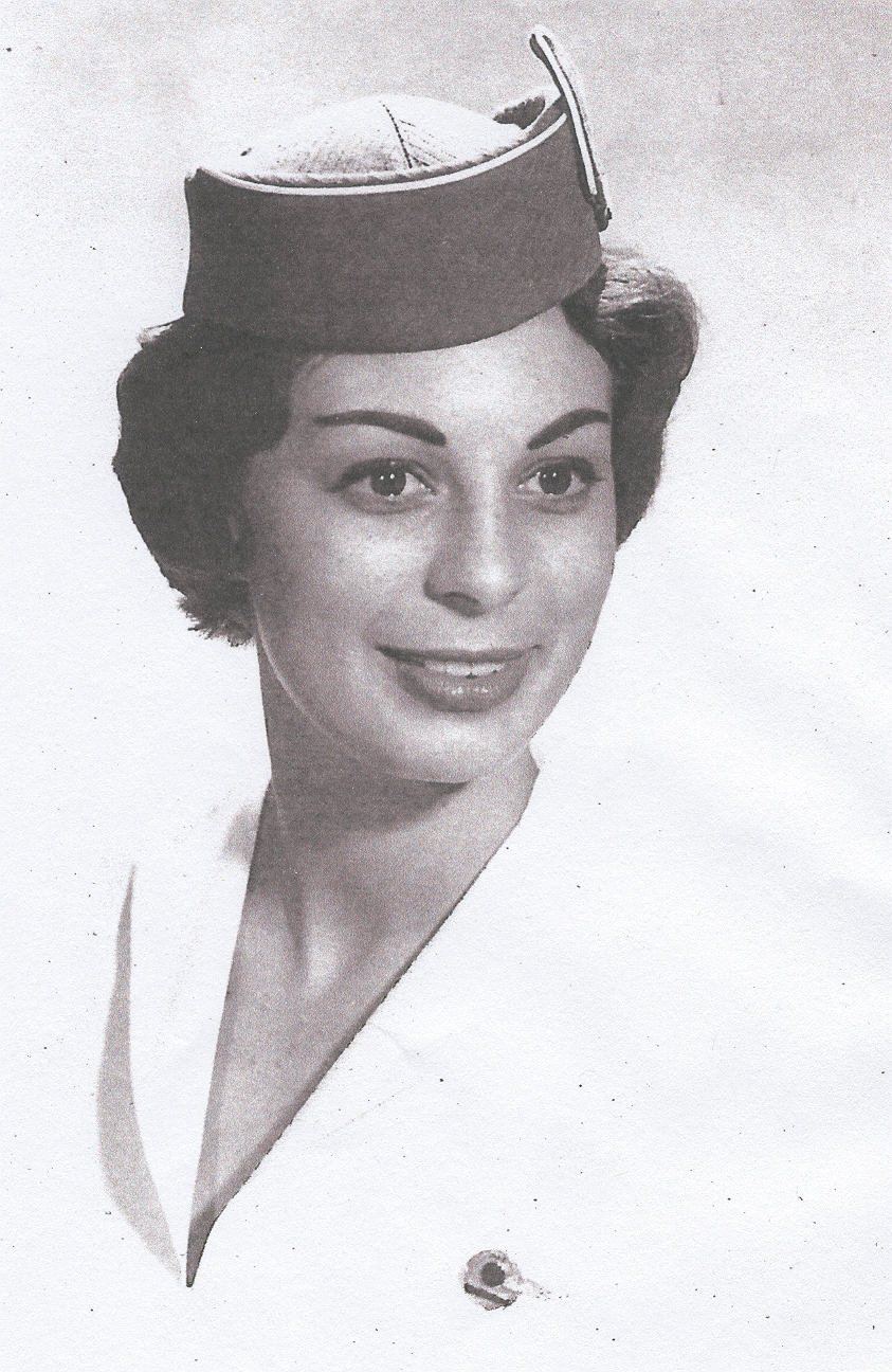1963 Lynn Van Hoof-Werner in hat and blouse with wings.  During summer months and for travel to tropical climates  Flight Attendants were permitted to remove thier uniform jackets and wear their wings on their blouse.